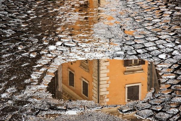 Italy-Rome Via di Ripetta-puddles after the rain